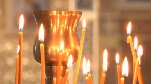 stock-footage-many-burning-church-candles